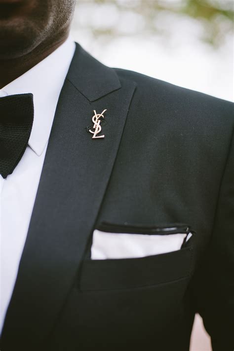 ysl lapel pin